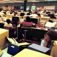 Images of computers and computer workers.